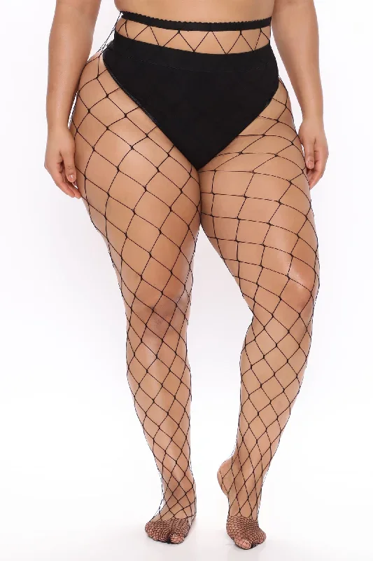 see-and-youll-find-fishnet-tights-black